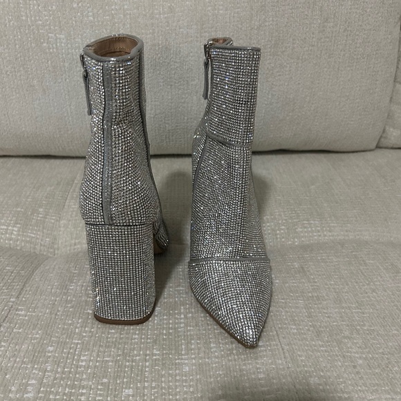 Steve Madden, Silver Sequin Booties
size 6.5
Worn once - Picture 2 of 3